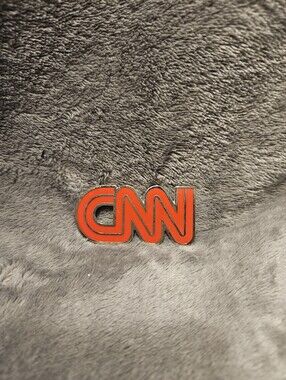 CNN magnet. Red and silver.